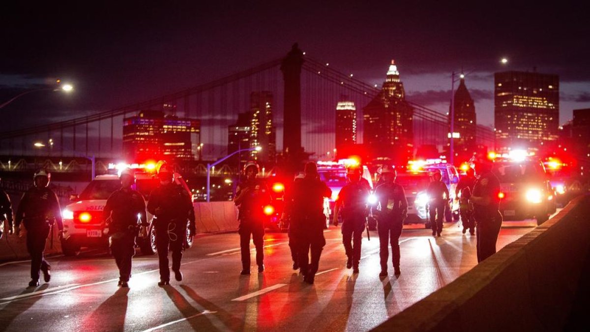 EE.UU. vive un nueva noche de disturbios cuando se cumple una semana de la muerte de Floyd