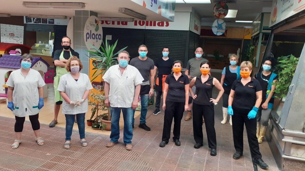 Foto de família dels paradistes del mercat municipal de Ronda-Fleming.
