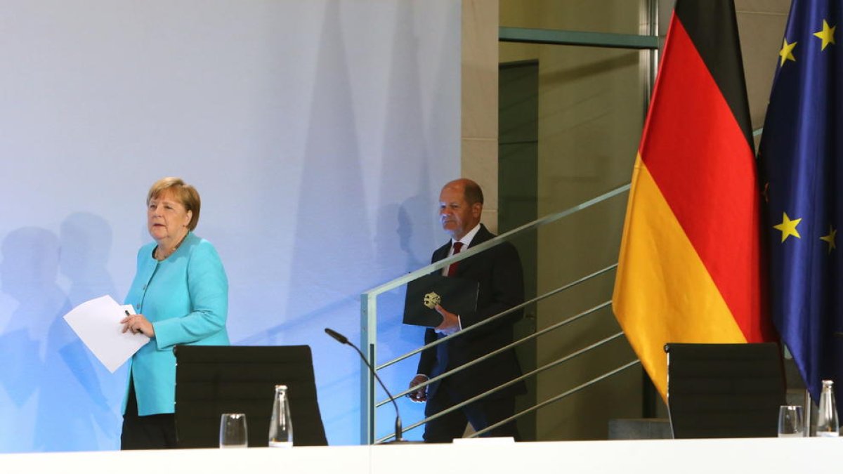 Angela Merkel i el seu ministre de Finances, Olaf Scholz.