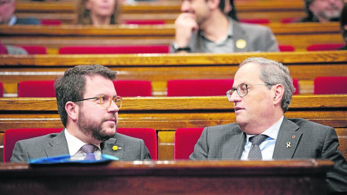 El president Torra y el vicepresident Aragonès en el Parlament, en una imagen de diciembre de 2019.