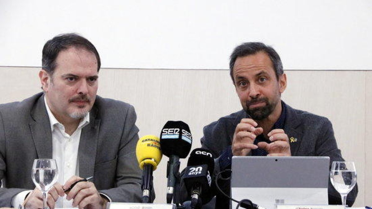 Joan Romero i Ramon Sentmartí, a la presentació de l’informe econòmic