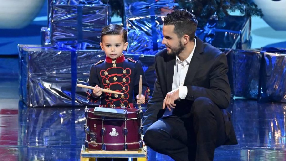 Hugo Molina con su padre.