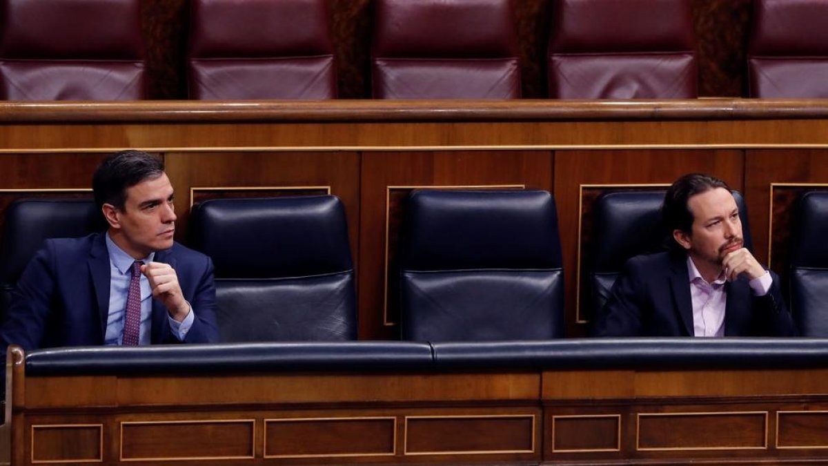 El presidente del Gobierno, Pedro Sánchez , y el vicepresidente segundo, Pablo Iglesias, en el Congreso.