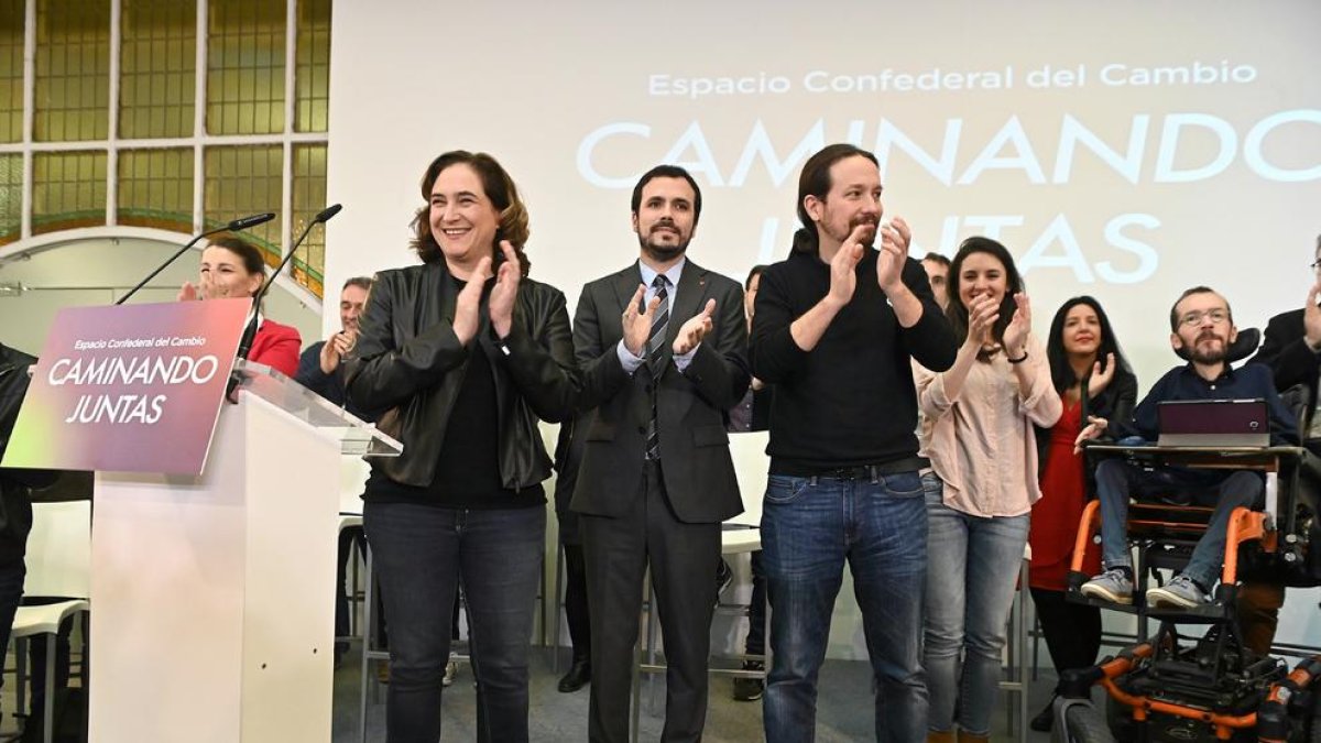 Ada Colau, Alberto Garzón y Pablo Iglesias en un acto, ayer.