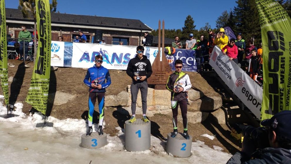 El podio absoluto, con Jaume Pueyo (1) y Gerard Palomo (2).