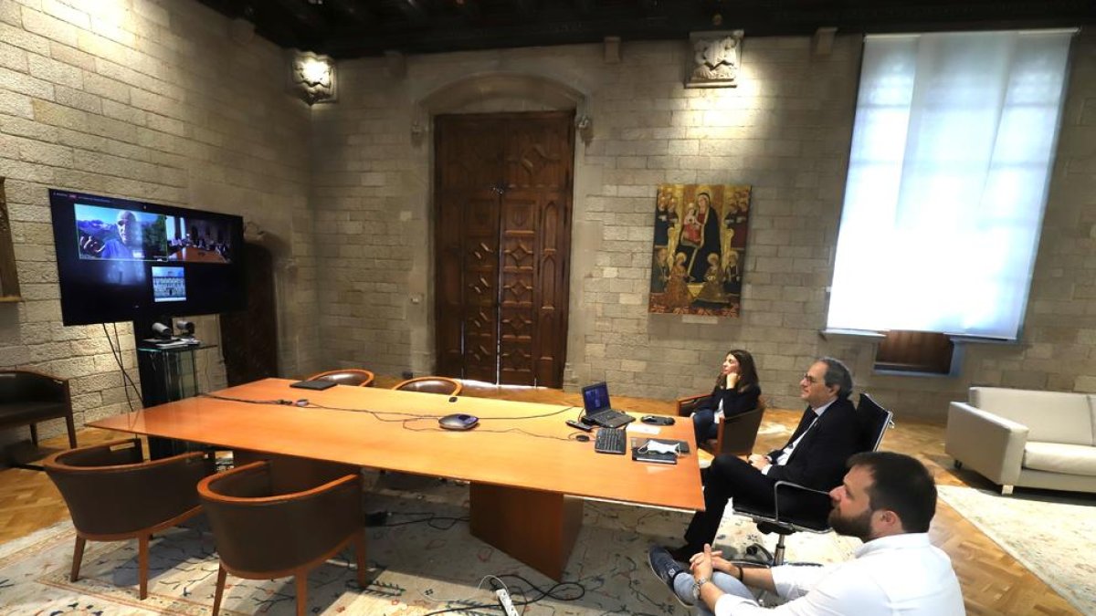 Torra, Budó y Figueras durante la conversación con Mingote.