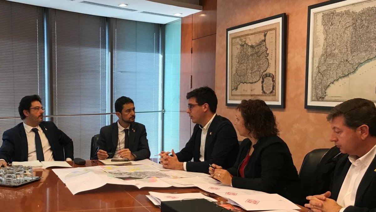 Postius y Calvet, durante la reunión ayer en Barcelona.
