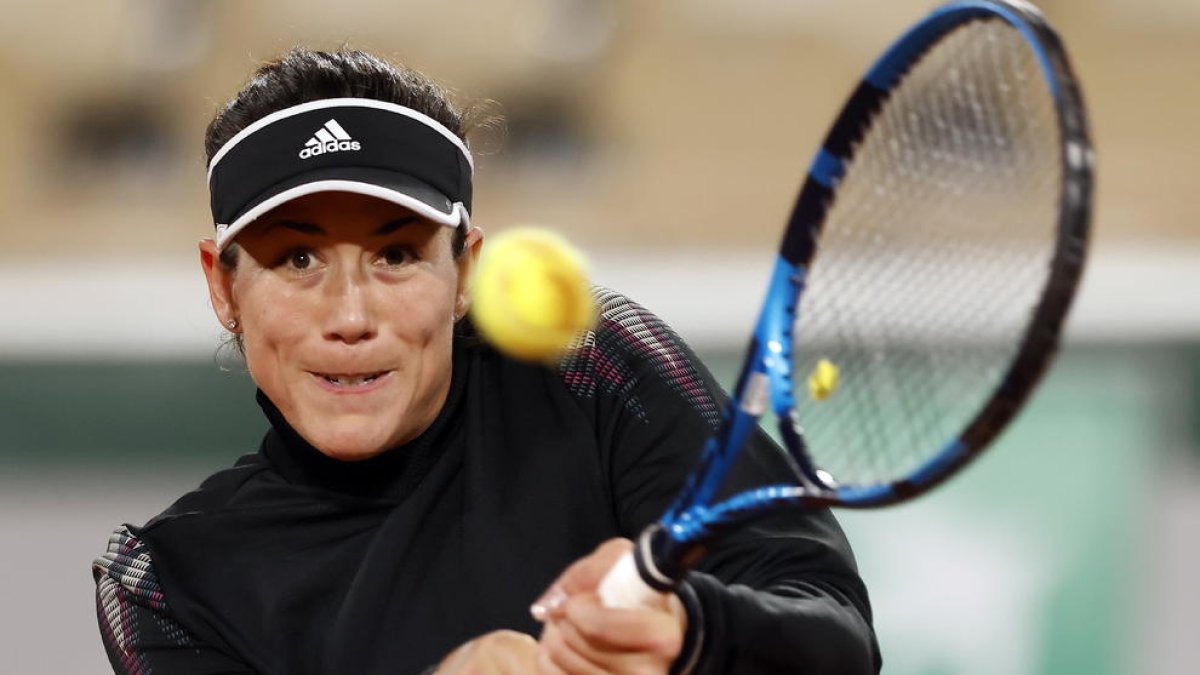 Muguruza va poder disputar el seu partit abans de la suspensió.