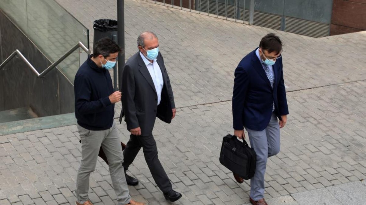 Reñé ha llegado a los juzgados acompañado de sus dos abogados