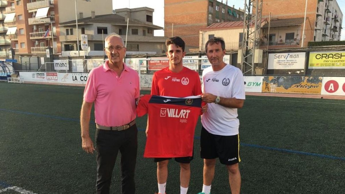 Eric Trota, flanquejat per Antoni Aiguadé i Edu March.