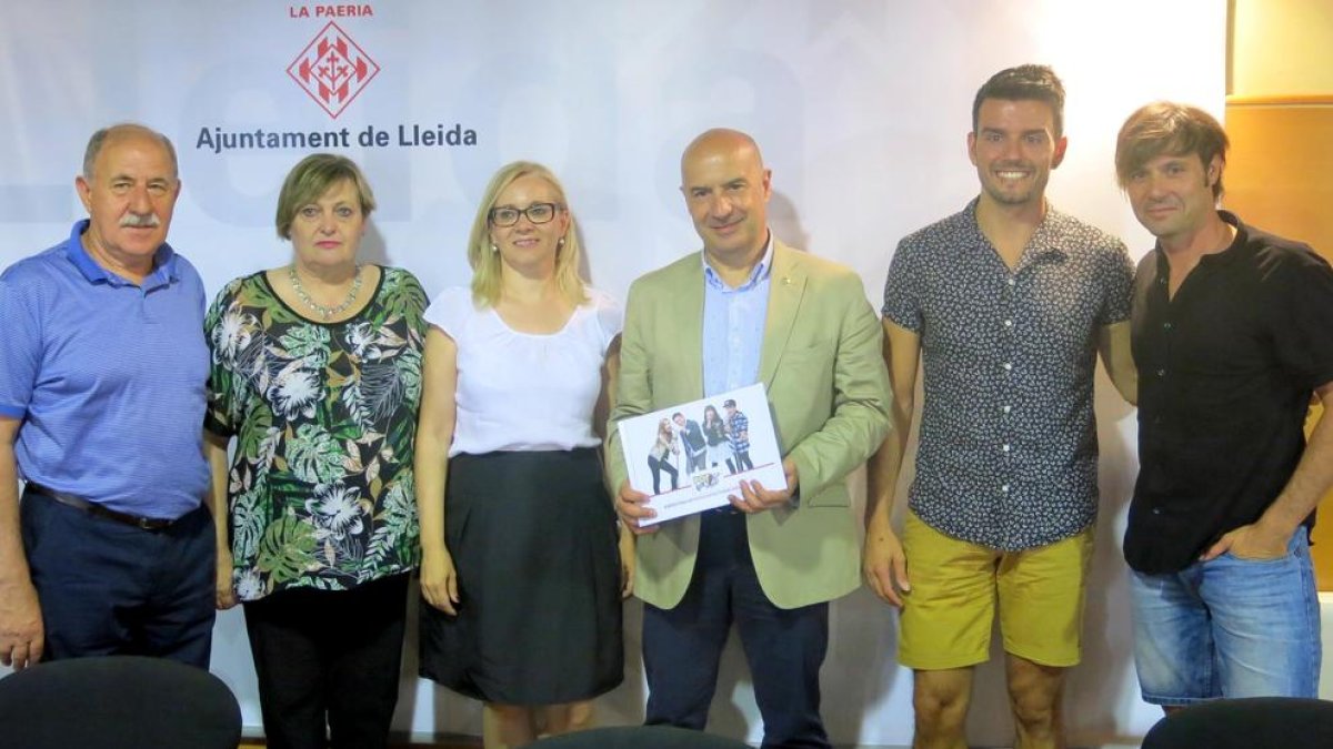 Els organitzadors durant la presentació a la Paeria.