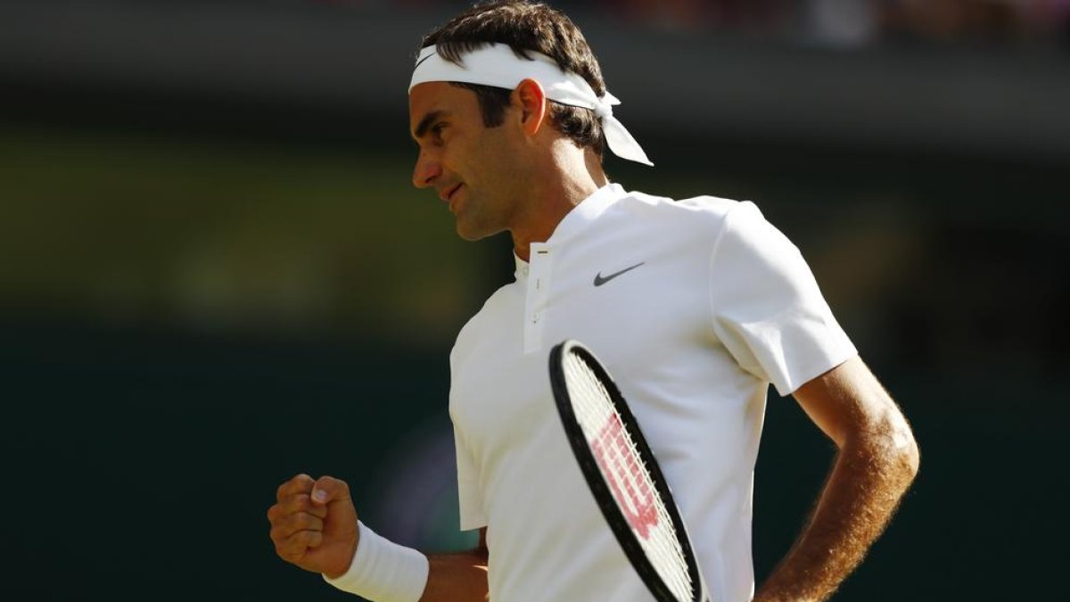 Roger Federer celebra un punto en su partido frente a Berdych.