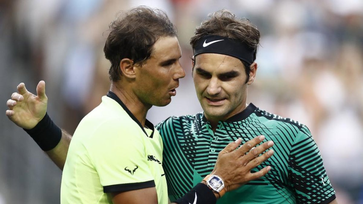 Nadal felicita Federer després del partit.