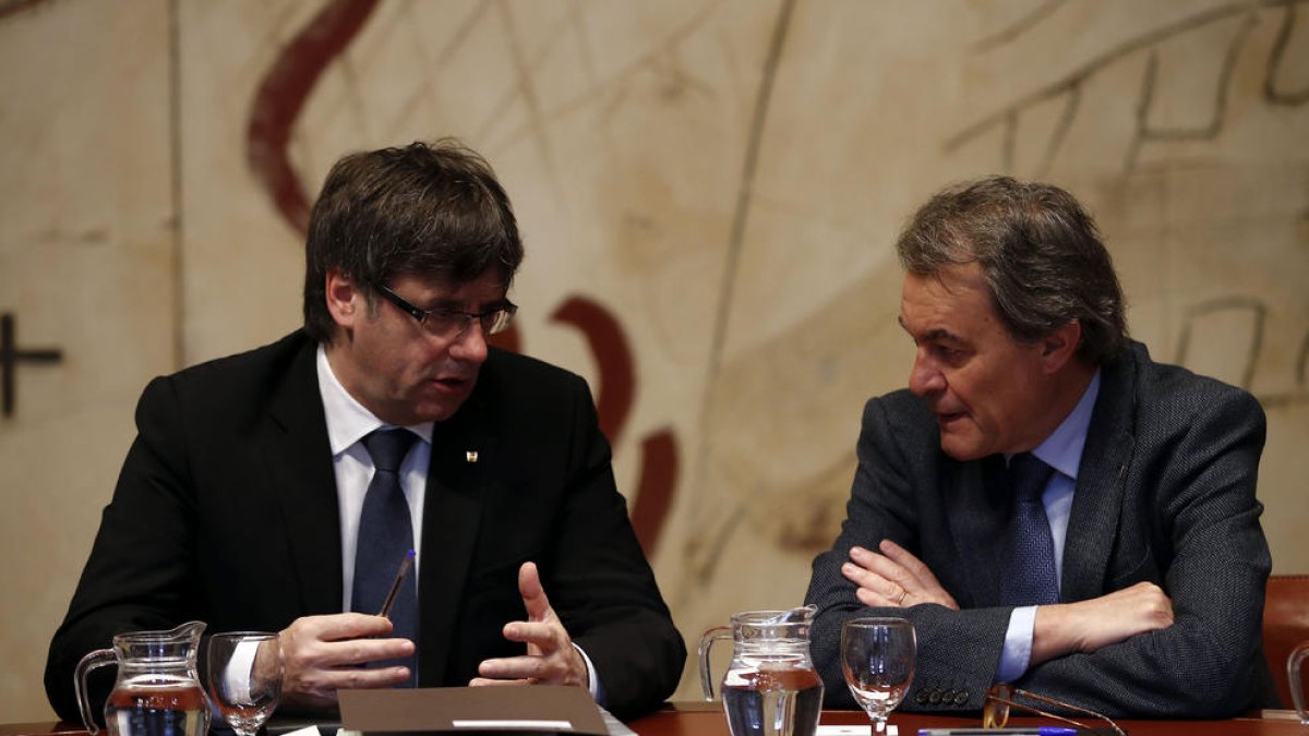 Carles Puigdemont i Artur Mas, reunits en una fotografia d’arxiu.