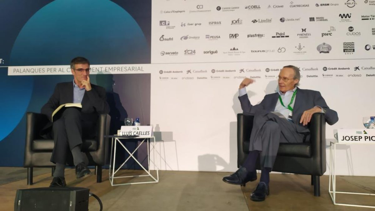 Lluís Caelles y Josep Piqué en la comida-coloquio.