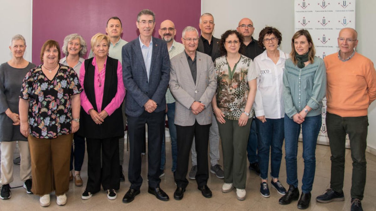 Jaume Puy, al centre, reelegit com a rector de la UdL.