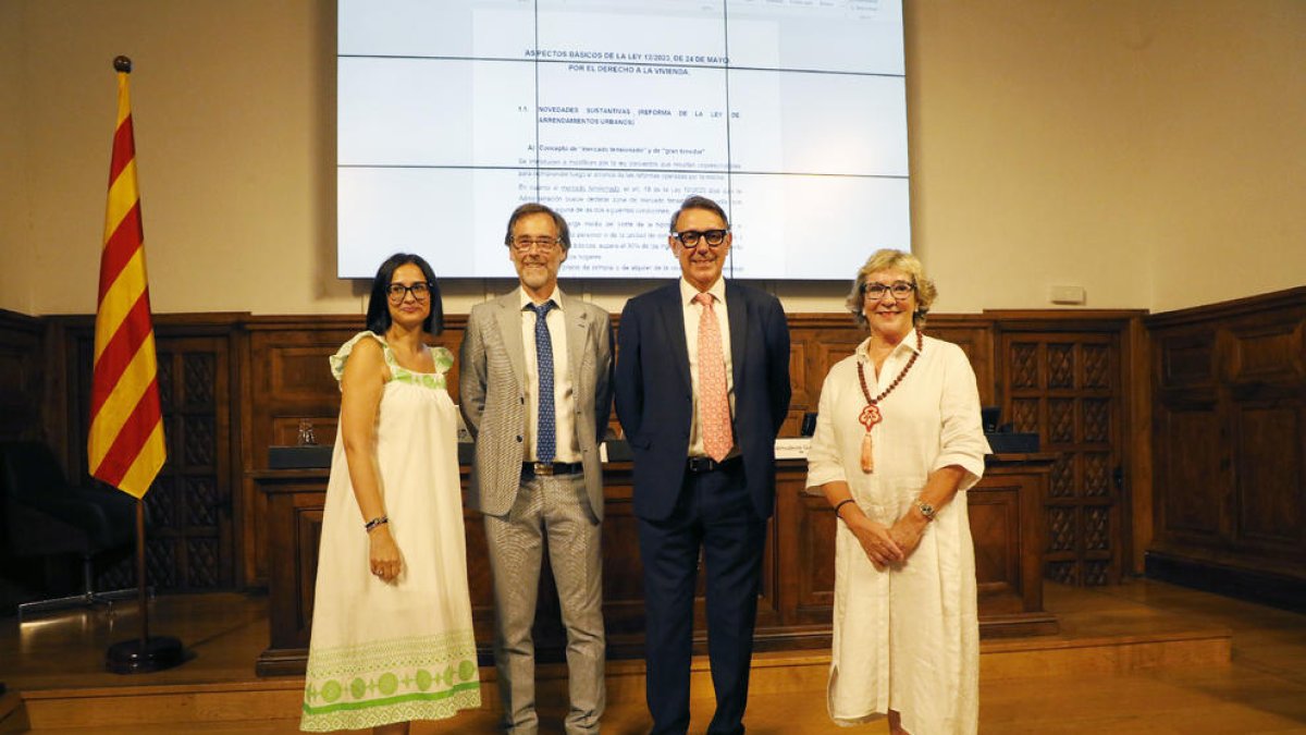 Homenaje ayer a los abogados Xavier Nayach y Josep Maria Domingo en el acto celebrado en el IEI.