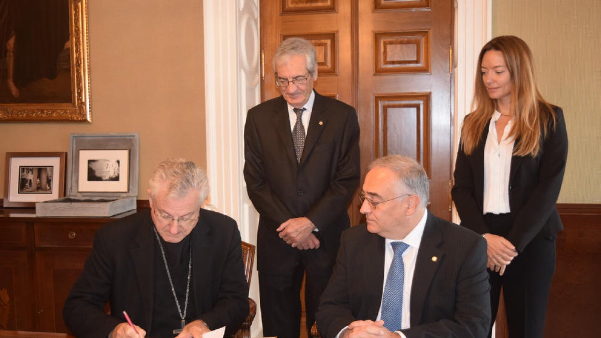 La firma, ahir entre el bisbat, Andorra i Benito Menni.