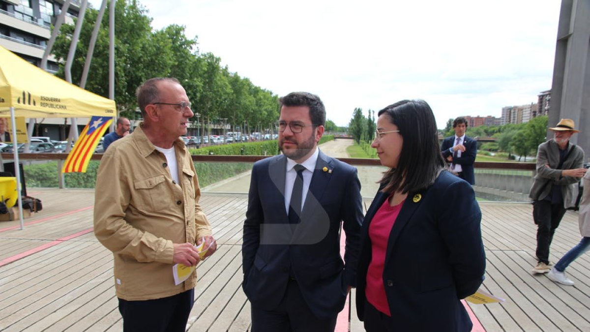 El presidente Aragonès, con Pueyo y Freixanet este viernes en Lleida.