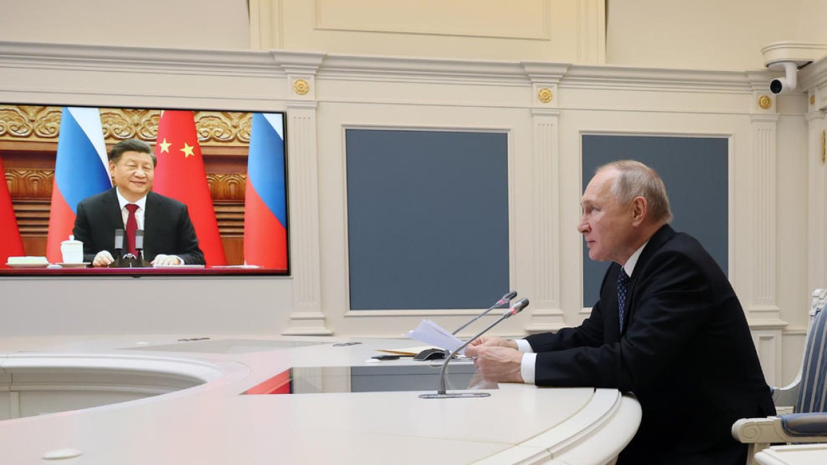 Putin y Xi durante la reunión telemática celebrada el viernes.