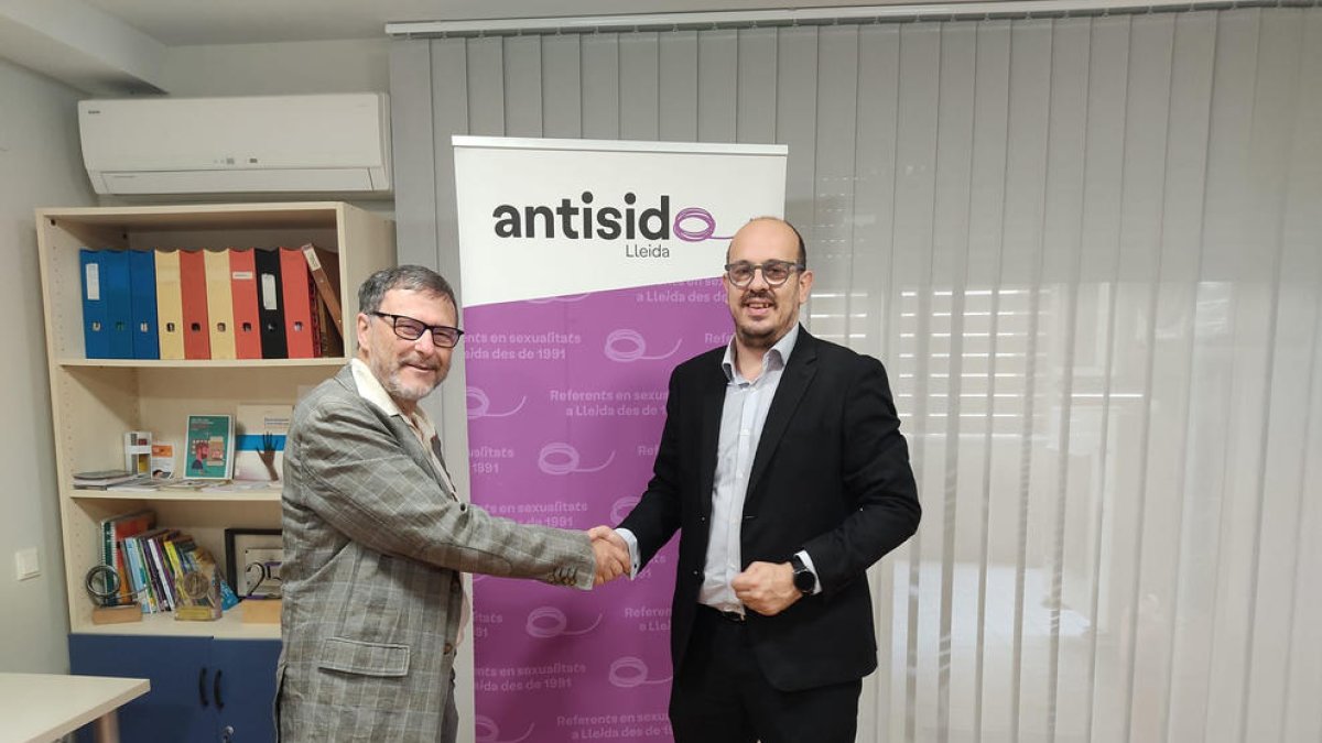 Joan Fibla, d’Antisida, i Geremi Camí, de CaixaBank Lleida.
