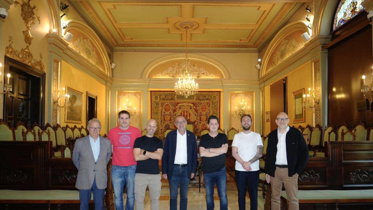 Representantes de las dos compañías leridanas y del ayuntamiento de Lleida.