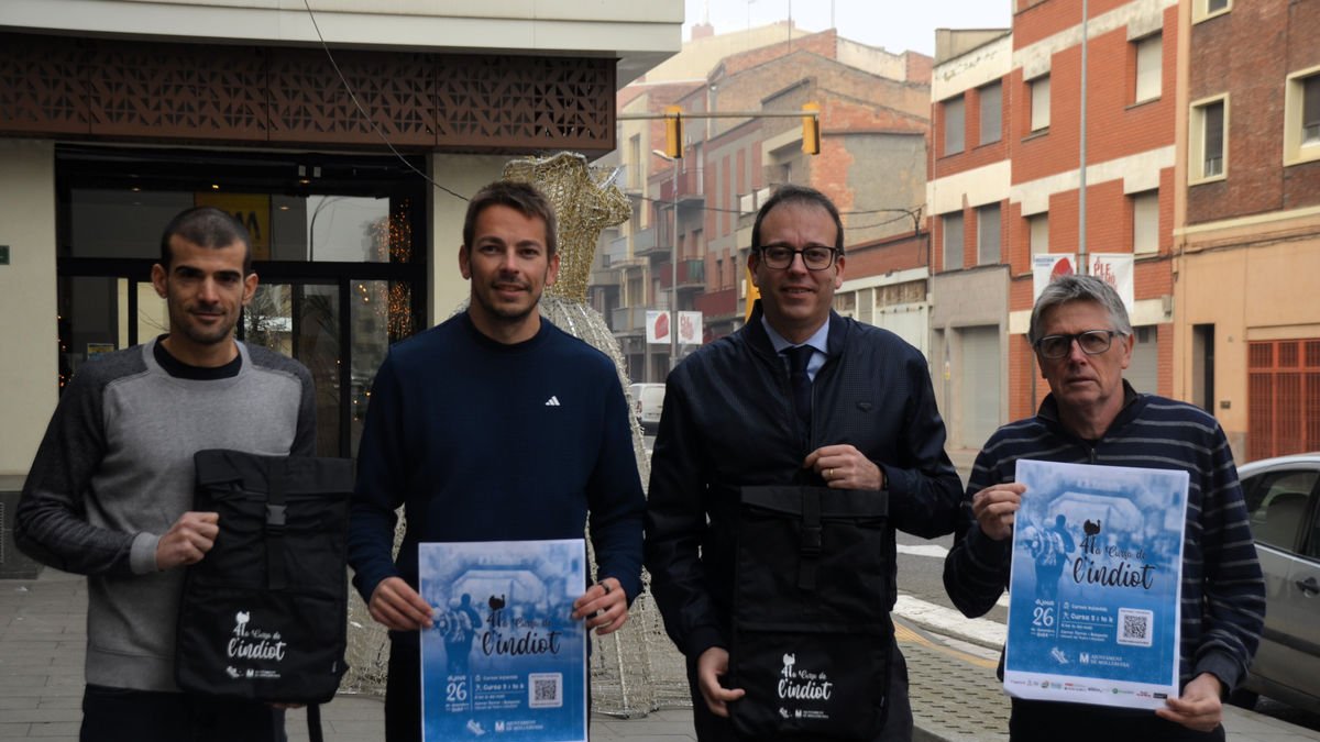Miembros de la organización y el alcalde, en la presentación de la carrera. - AJUNTAMENT DE MOLLERUSSA’