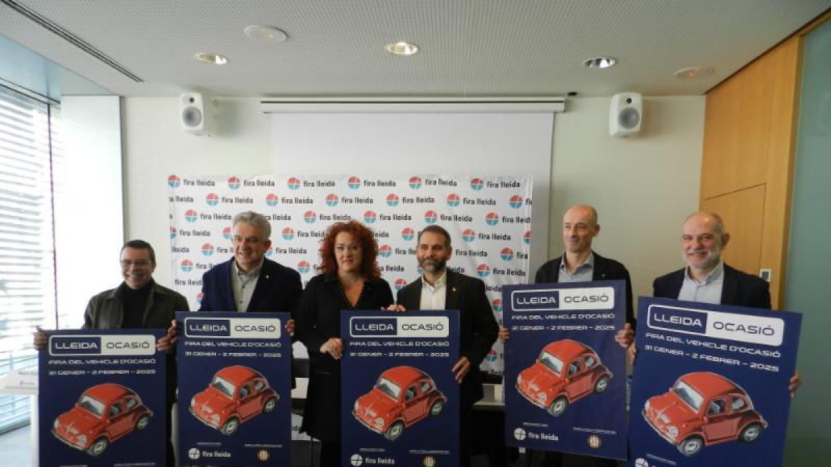 Los participantes en la presentación, con el cartel del certamen. - FIRA DE LLEIDA