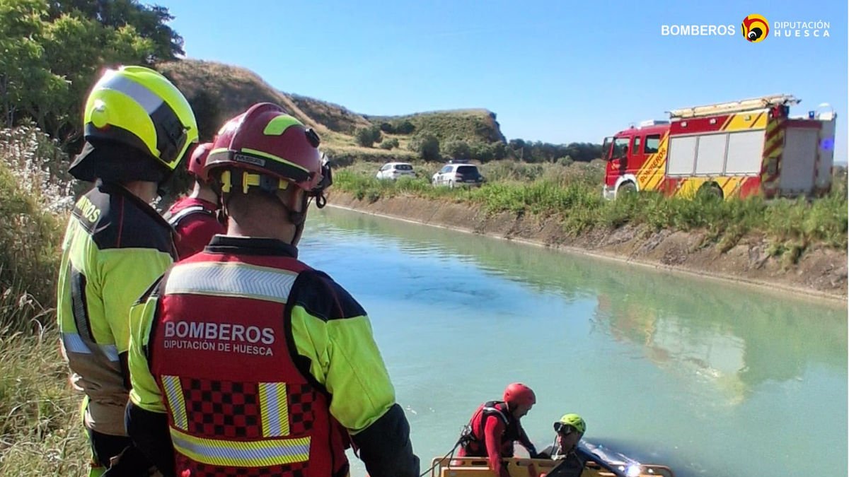 Bomberos y Guardia Civil durante las tareas de rescate de la víctima mortal. - BOMBEROS DIPUTACIÓN DE HUESCA