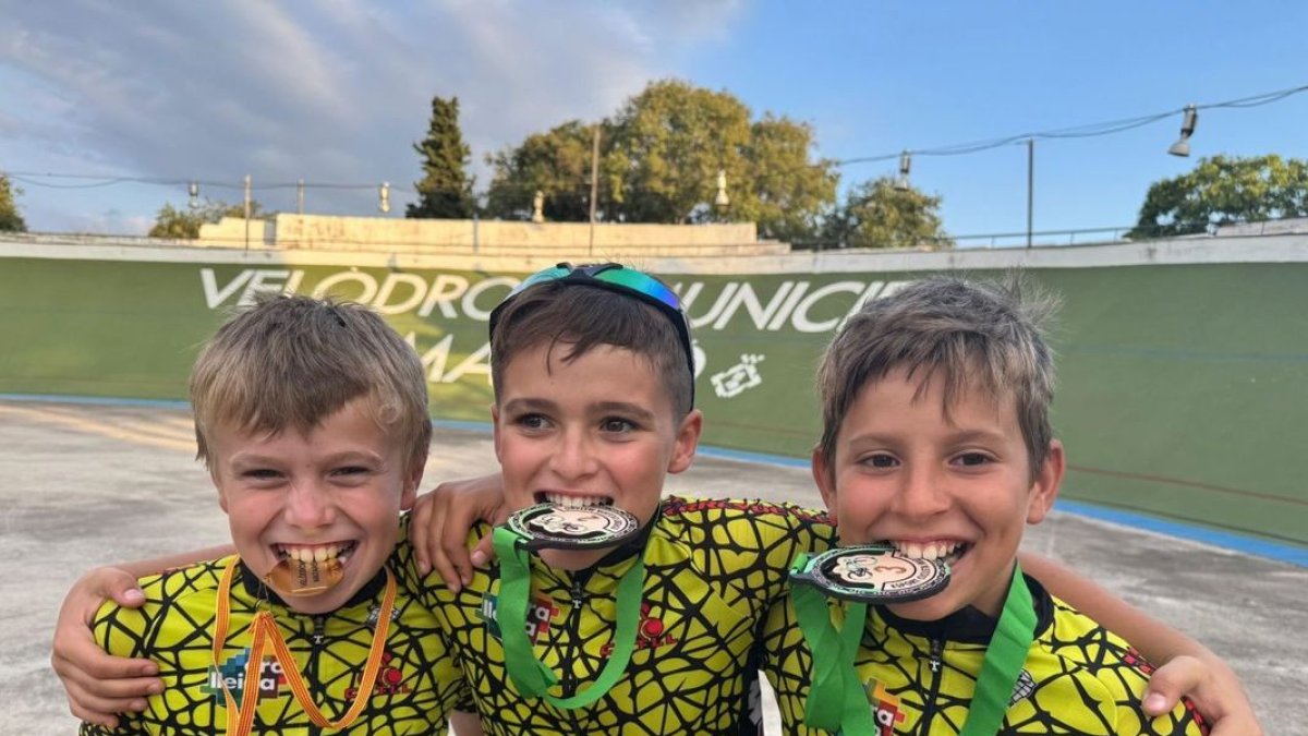 Pau Roca, Quim Fanlo i Quim Florensa, amb les medalles.