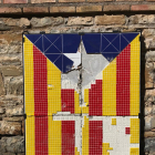 El mosaico de la estelada de la Pobla, rotura.