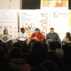 Usuaris d’entitats de Lleida van llegir ahir el manifest del Dia Internacional a l’IEI.