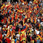 Las manifestación, llena de banderas españolas.