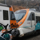 Imatge de l'encalç de dos trens a l'estació de Montcada i Reixac Manresa