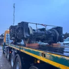 El bogi del cotxe número vuit del tren Iryo accidentat a Adamuz és transportat en un camió. - EUROPA PRESS